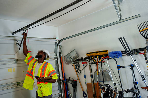Professional Garage Door Installation technician working in Greenville, IN